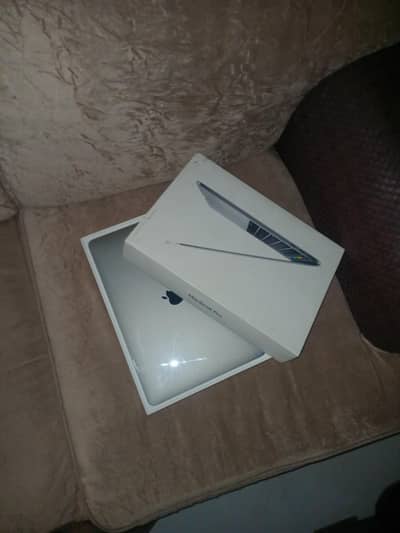 macbook pro with its original charger and 10/10 condition for sale