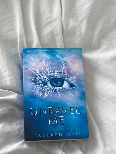 unravel me book