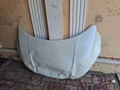 honda vezel bonnet dent
