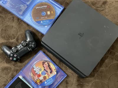 PlayStation 4 slim/ 1 TB. Along with GTA 5 and Uncharted 4 discs.