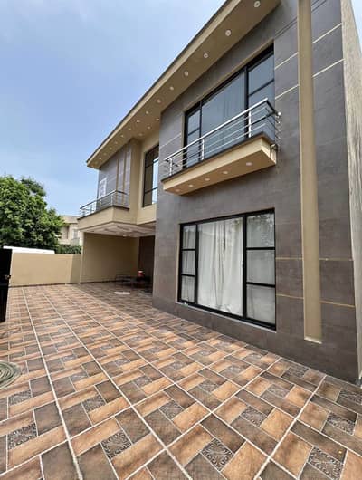 Ultra-Modern 1-Kanal Designer Home In DHA Phase 3 Near Packages Mall
