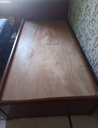 Wooden single bed