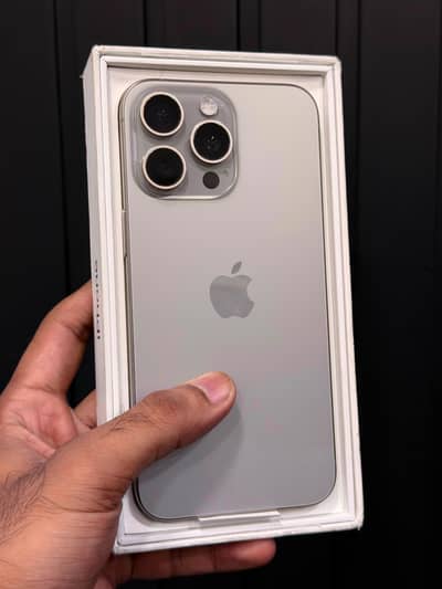 iPhone 15 pro max Natural Titanium 1025 GB PTA-APPROVED Water pack