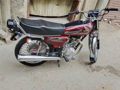 Honda 125 red colour engine ok all ok 2nd owner nam