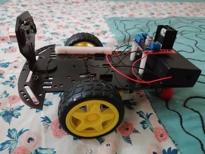 Rechargeable Line Following Obstacle Aboiding Robot
