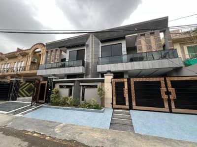 10 marla Brand New house for sale in johar town block F (original picture) 6 bed  double unit  double kitchen  gated community