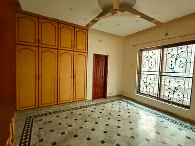 12 Marla house for sale in johar town block A2 marble floor 6 bed (original picture) Double kitchen  double unit  hot location  main apporched  gated community