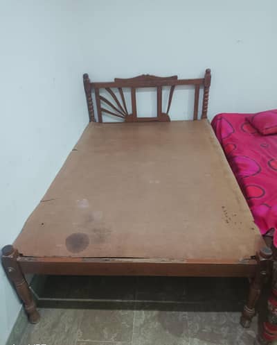 single wooden bed