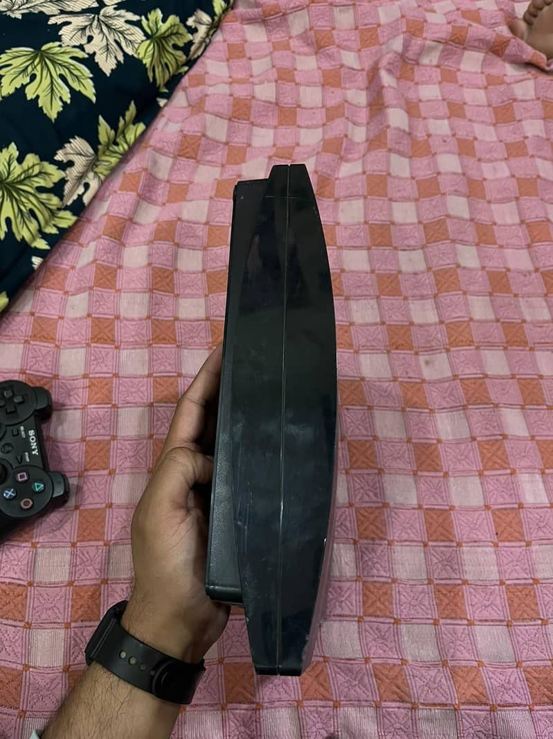 PS3 with 2 controller 4