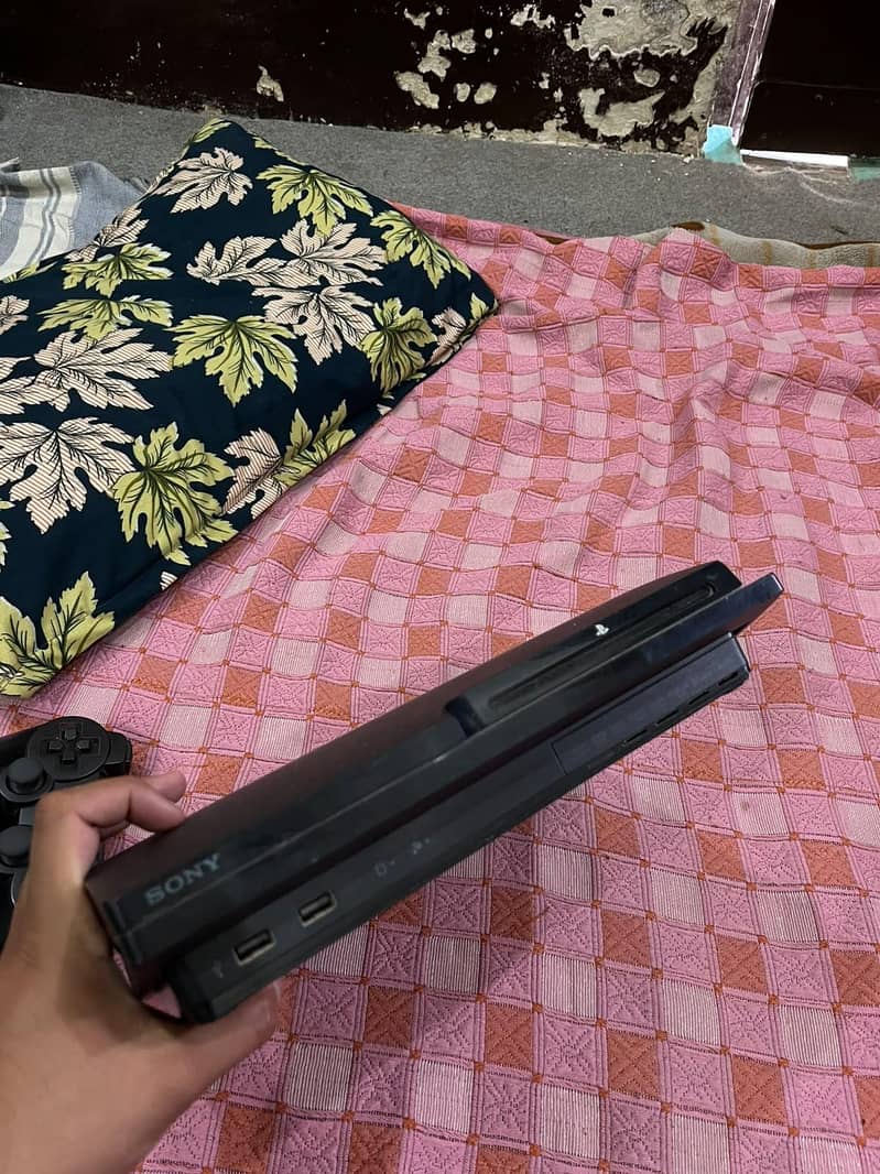 PS3 with 2 controller 5