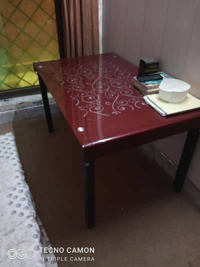 Glass top maroon table for sale