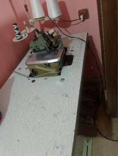 ya overlac machine hai new 2 day used only
