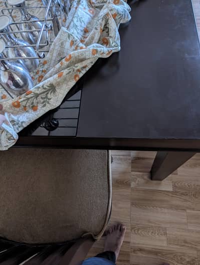 wooden dinner table and chairs
