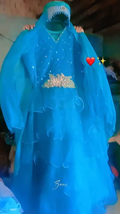 Its a Barbie type frock with  Turkish cap
