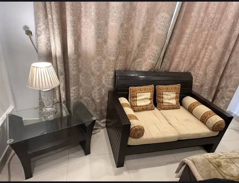Two seater solid wood Sofa and table 0