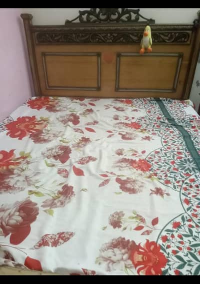 bed with mattress and dressing