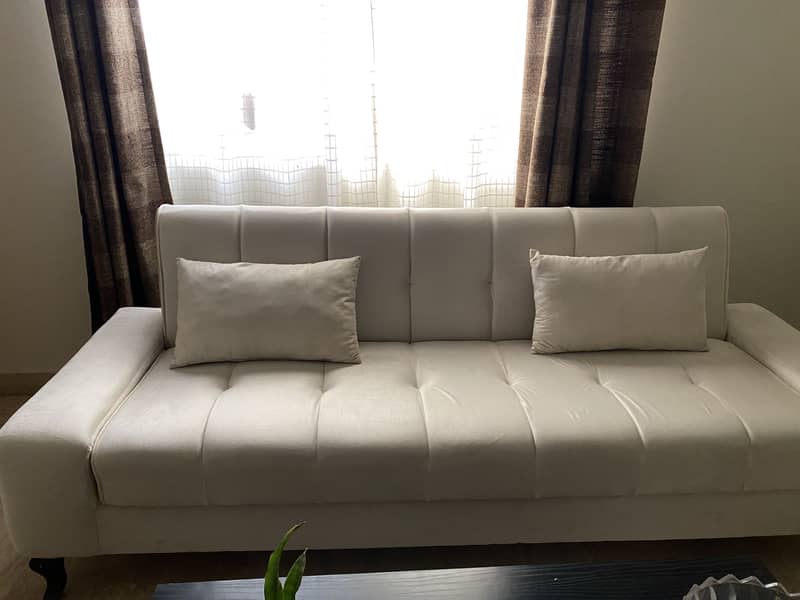 2 sofas- slightly used 1