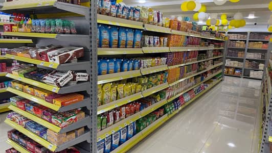 racks,grocery store racks,pharmacy racks,tuck shop rack,book shop rack