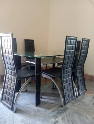 6 seater glass dinning table set with with tiled base design