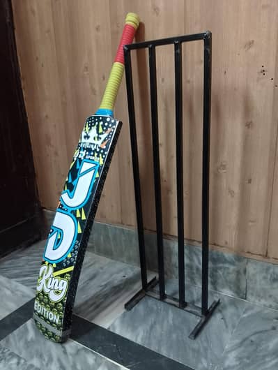 JD bat and wicket