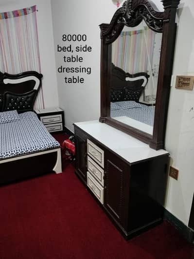 Bed along with side table and dressing table