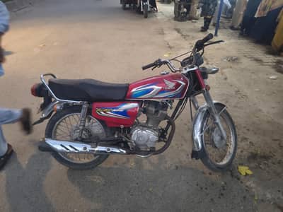Honda 125 red colour
