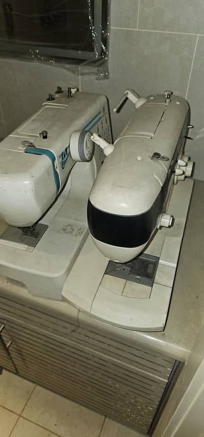 2 fully automatic sewing machines