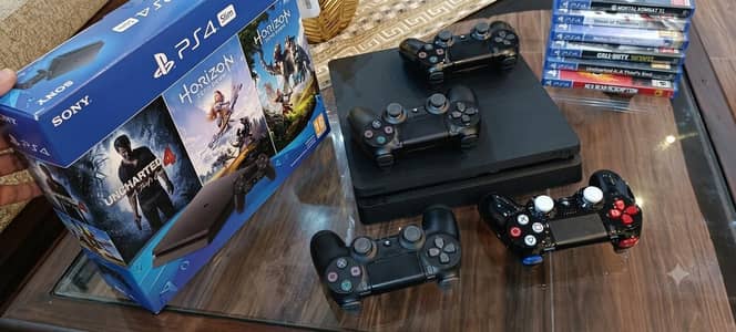 10/10 PS4 slim with 4 controllers for sale -,033.96.96. 9,606