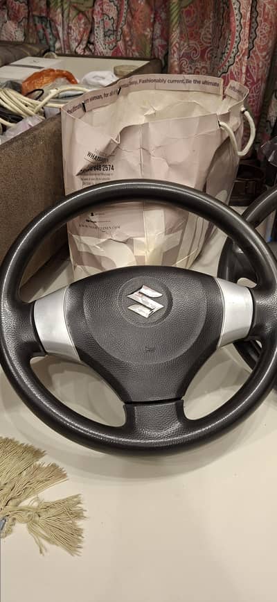 1. Suzuki WagonR + Toyota Belta Steering + front AC vent sheild