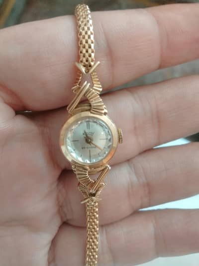 Swiss watch. 18 K gold.