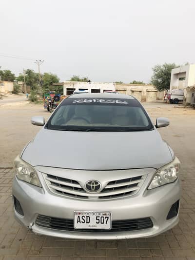 Corolla Gli 2009 model silver color urgent sell