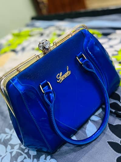 Ladies stylish blue handbag/ excellent condition