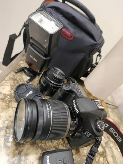 Canon 60d with 18-200mm and 50mm Lense. Godox Flashgun
