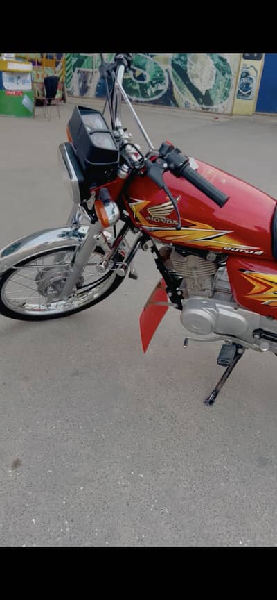 Honda 125 red  03107100029
