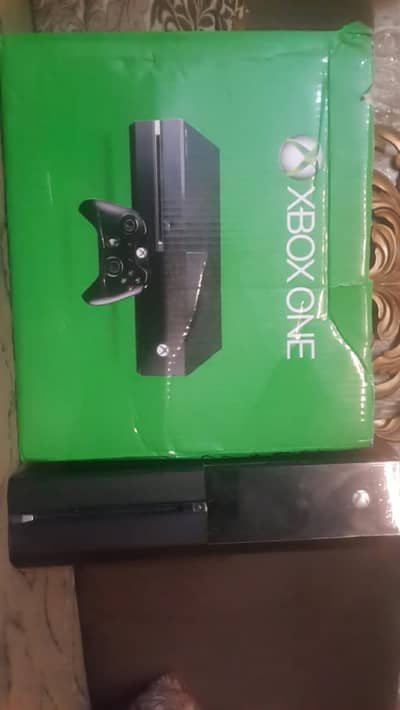 Xbox one with two controllers and 90 plus games