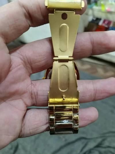 Rado watch  gold dial Day date display