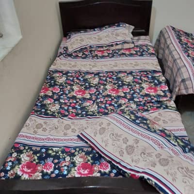 wooden single bed