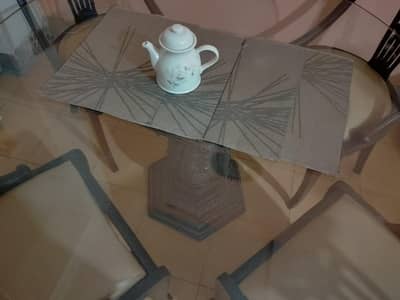 top glass dining table with chairs