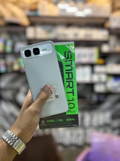 Infinix smart 10plus 4/128gb with box and charger under warranty