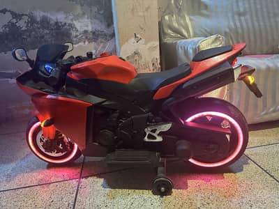 Baby Charging Heavy Bike.