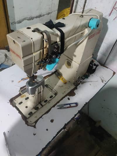Feedrol Golden wheel double needle machine
