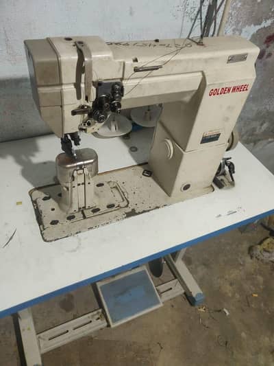 Feedrol Golden wheel double needle machine