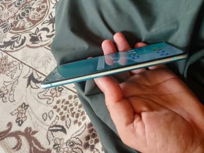 One Plus 8t 12/256 dual SIM PTA approved minor shade galss ball crack