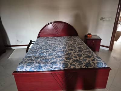 Bed with side tables
