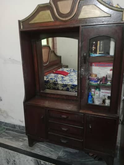 bed and five seat sofa and barten wali almari