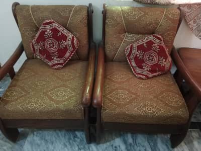 bed and five seat sofa and barten wali almari