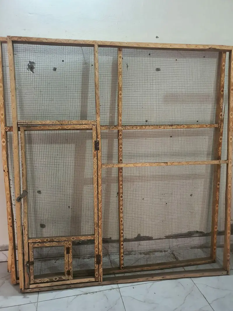 1 solid iron cage 2.5 x 1.5 ft, 1 heavy wooden cage — photo 7