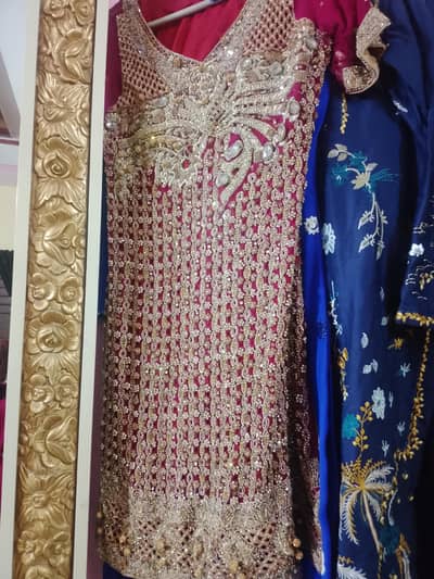 red coloured lehnga choli for bridal. beautiful color and stone work