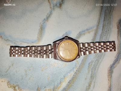 Vintage stainless steel watch-silver dial- working