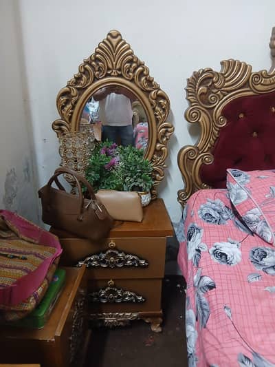 king size bed with dressing and two side table